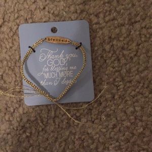 Never opened gold “blessed bracelet”
